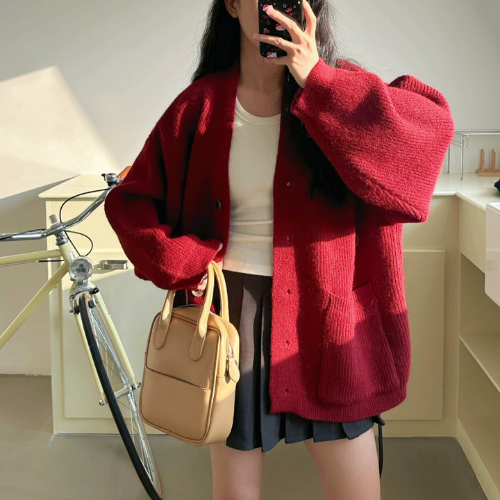 Kvindernes chunky strikket cardigan med elegante knapdetaljer og praktiske lommer Stilla