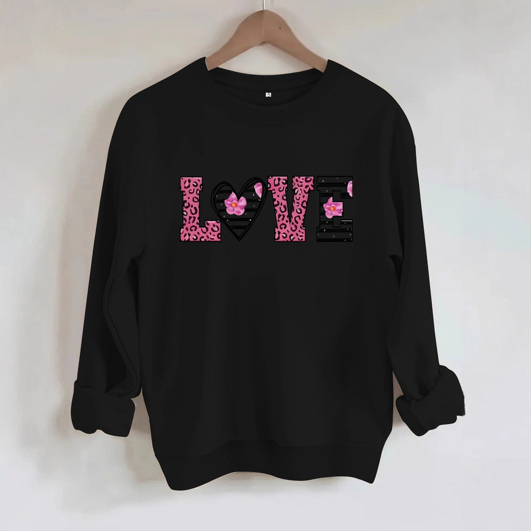Kvinders sweatshirt med moderne leopard hjerte design og behagelig pasform Stilla