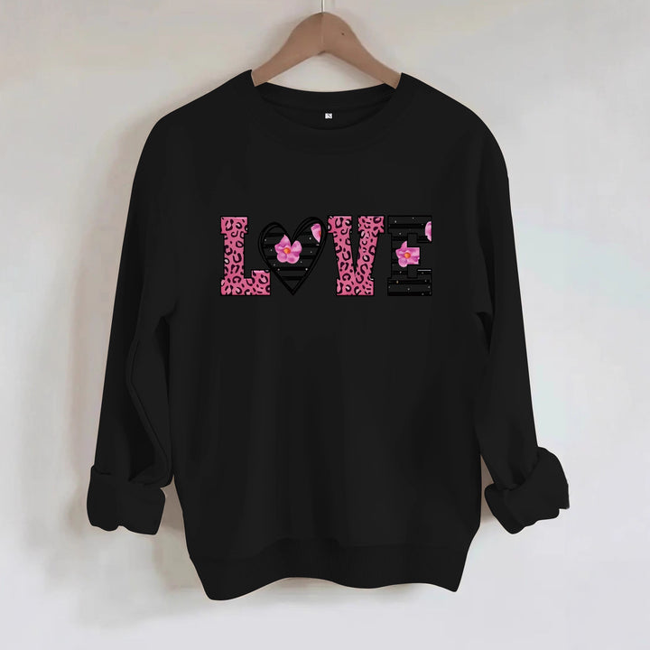 Kvinders sweatshirt med moderne leopard hjerte design og behagelig pasform Stilla
