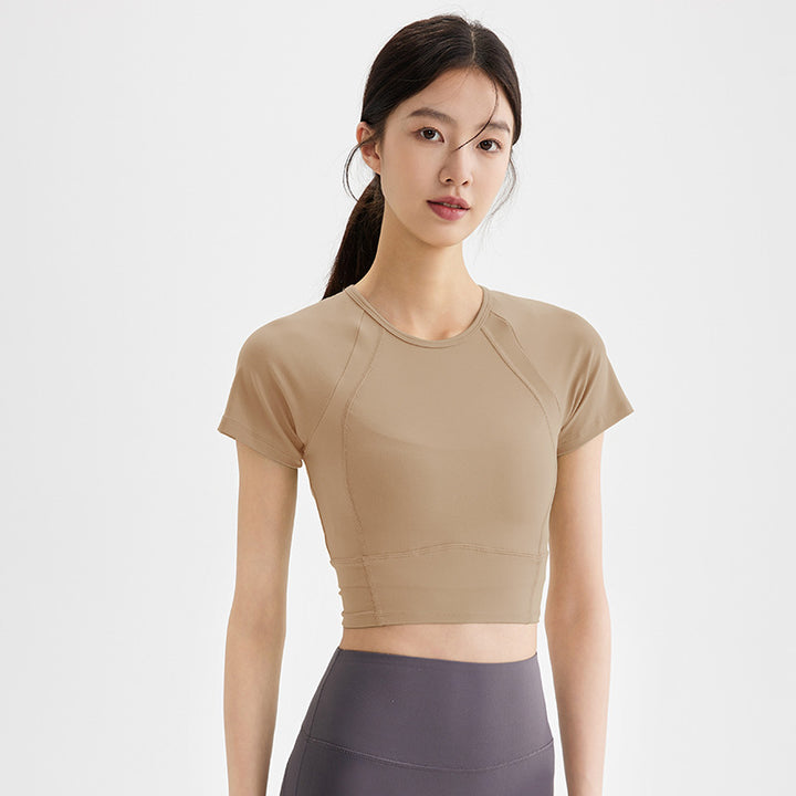 Dame sporty kortærmet crop-top med åndbare indsatser og elastisk pasform Stilla