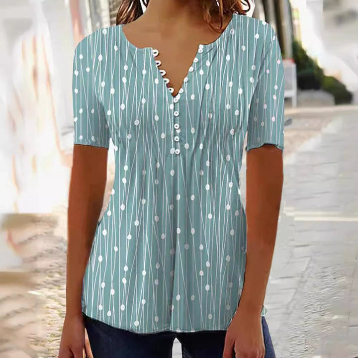 Dame bluse skjorte med moderigtigt prikkedesign og elegant knapliste Stilla