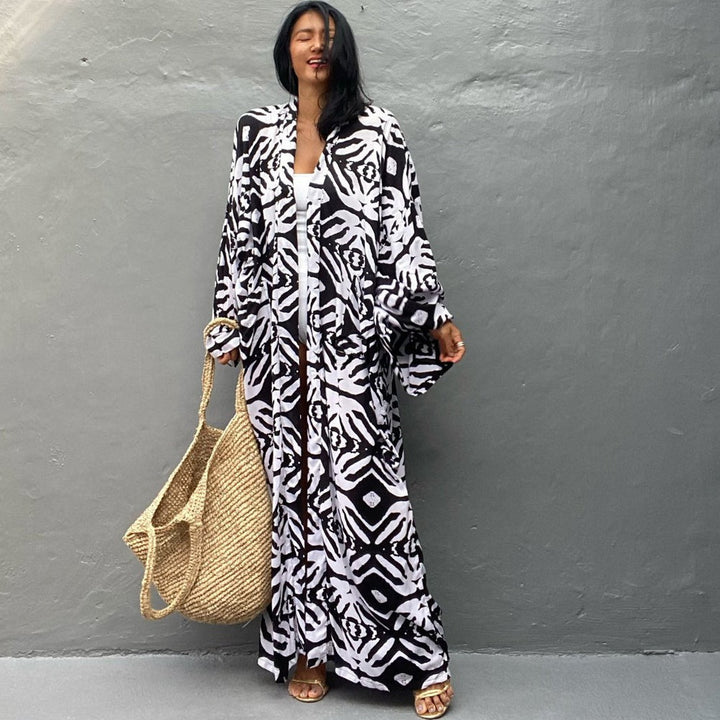 Dame til strandmode inspireret kaftan med eksklusivt palmetræmønster Stilla