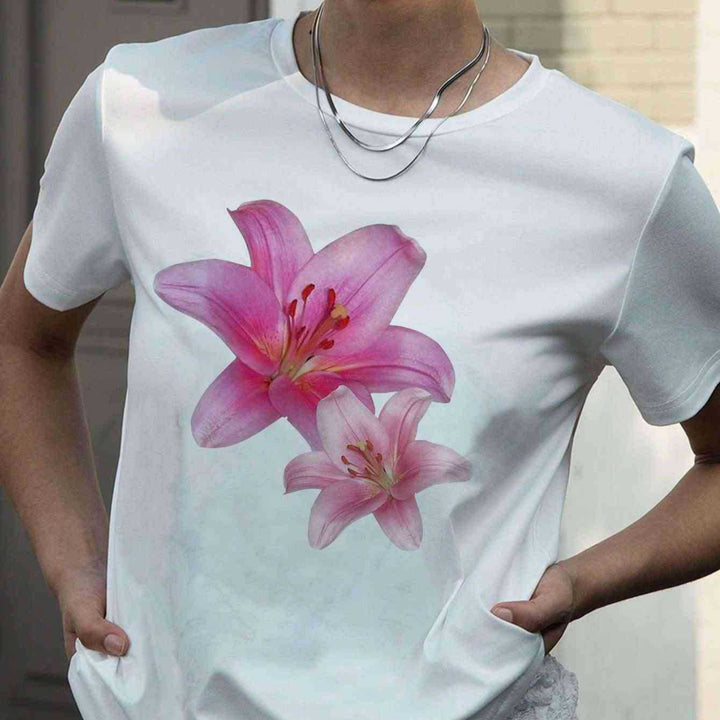 Dame T-shirt med blomsterprint og komfortpasform Skovae