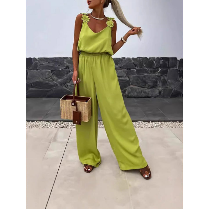 Dame jumpsuit med blomstrede flæser og brede ben Skovae