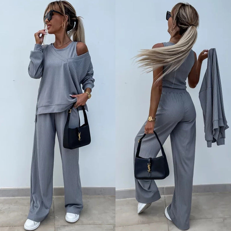 Kvinders afslappede outfit med sideåbninger og bred pasform
