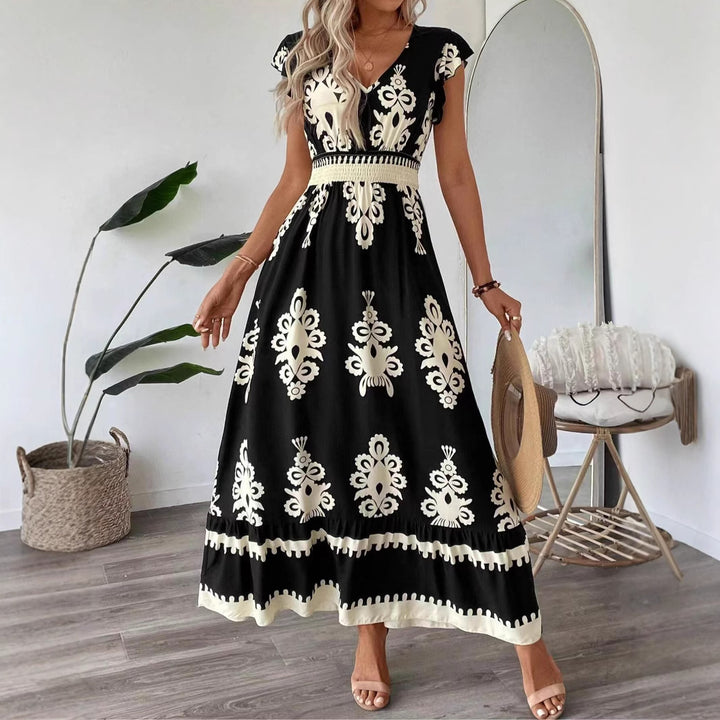 Dame broderet maxikjole med v-hals Stilla