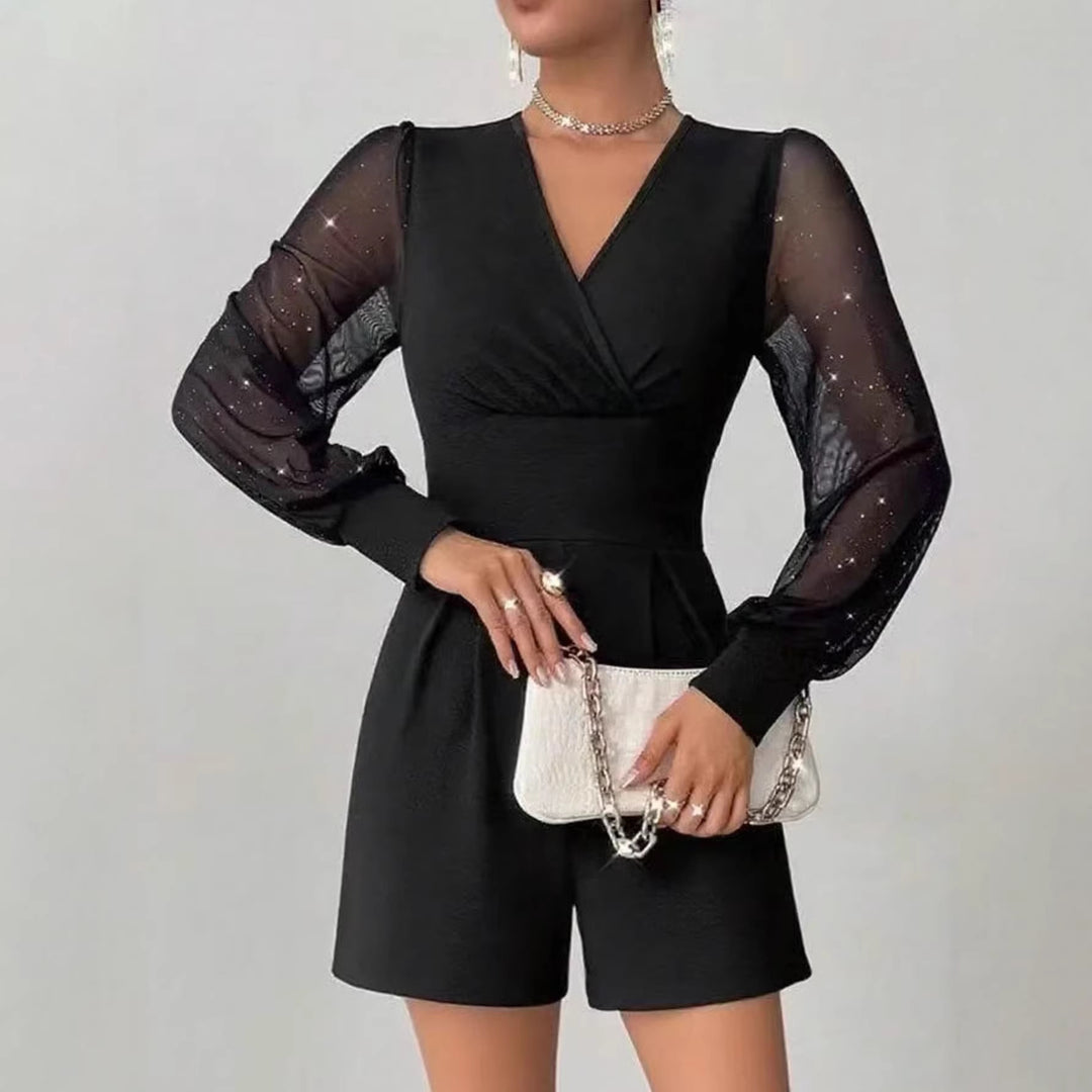 Dame elegant jumpsuit med gennemsigtige pufærmer og V-udskæring Skovae