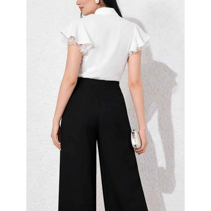 Damebluse med ruffles ærmer og feminin sløjfe Skovae