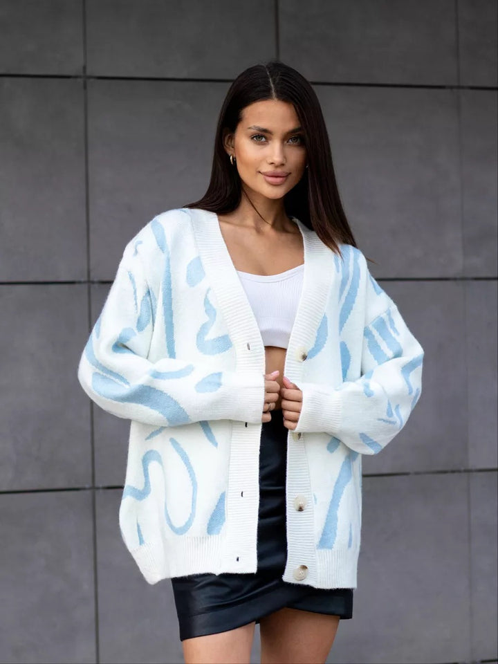 Dame cardigan med moderne mønster og elegante knapper
