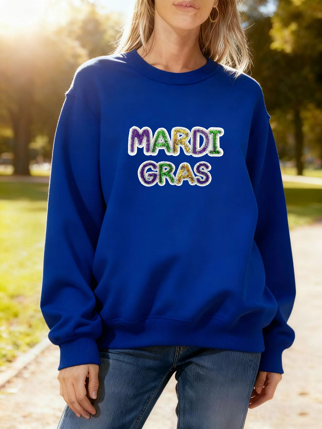 Women's sweatshirt with vibrant Mardi Gras lettering Stilla