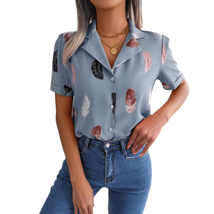 Damebluse med elegant fjerdesign Stilla