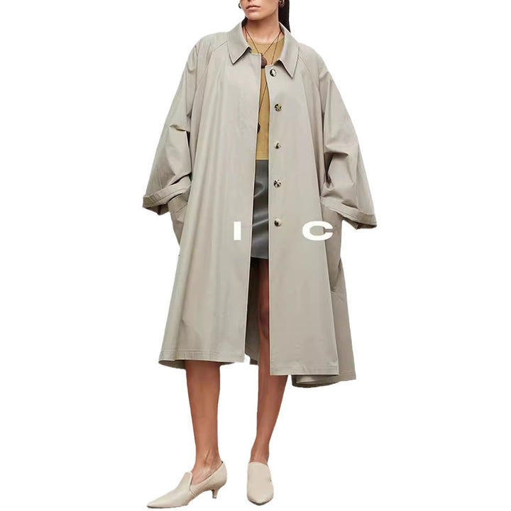 Kvinders afslappede trenchcoat med oversized ærmer og knapdetaljer Stilla