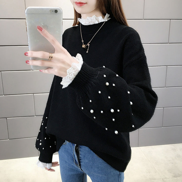 Dame trendy strikpullover med perledetaljer og voluminøse ærmer Stilla