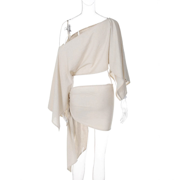 Dame indpakningsbluse med asymmetrisk snit og elegante ærmer Skovae