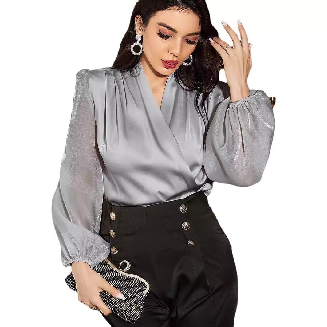 Damebluse med elegant vikleeffekt og gennemsigtige ærmer Stilla