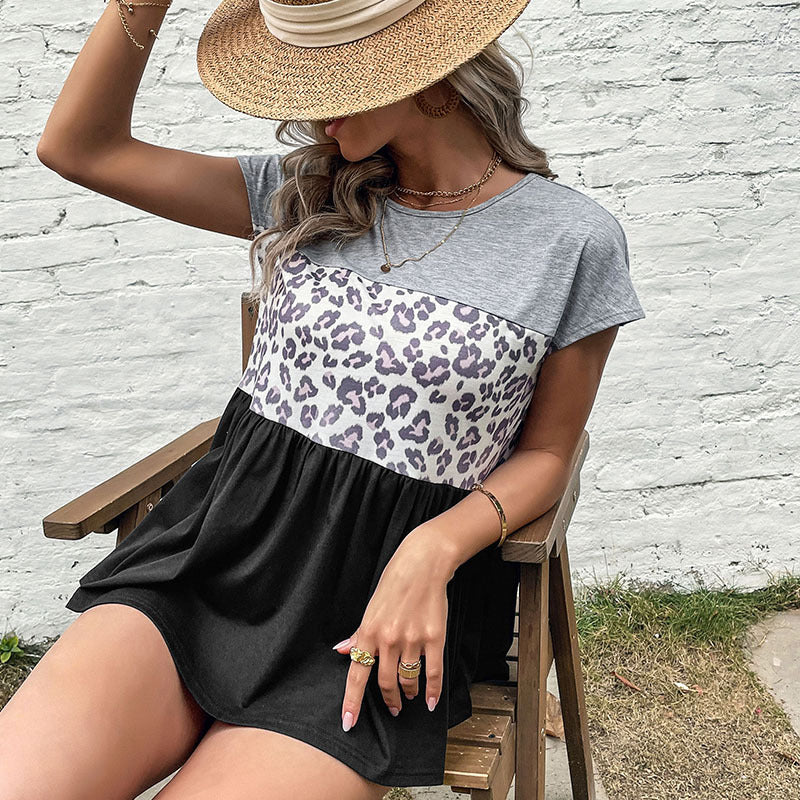 Kvinders fashionable top med dyreprint og asymmetrisk kant Stilla