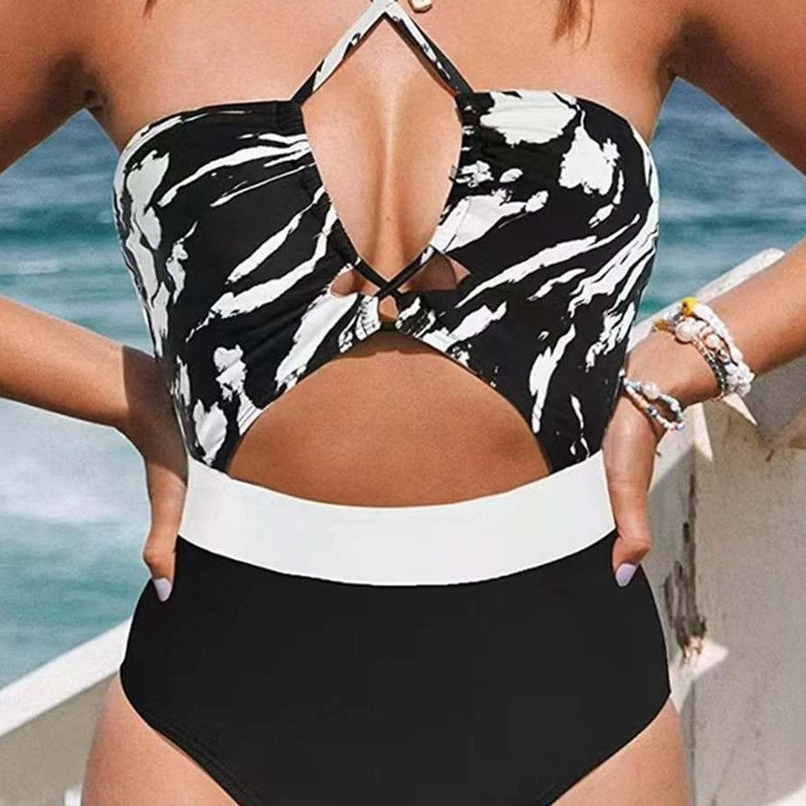 Dame én-delt badedragt med raffineret cut-out design og justerbare stropper Stilla