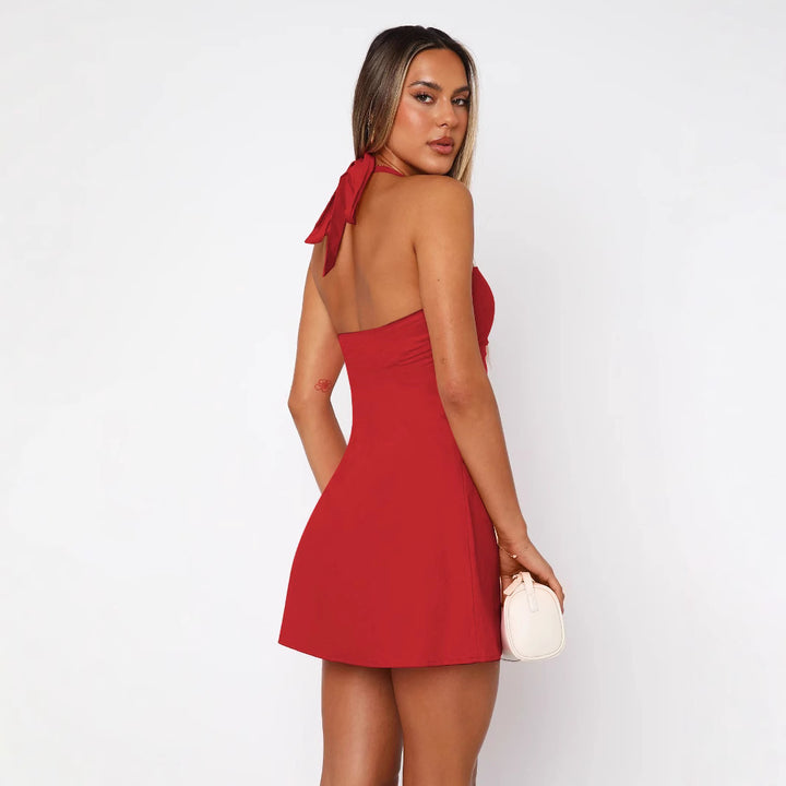 Dame Minikjole med halterneck og figursyet design Stilla