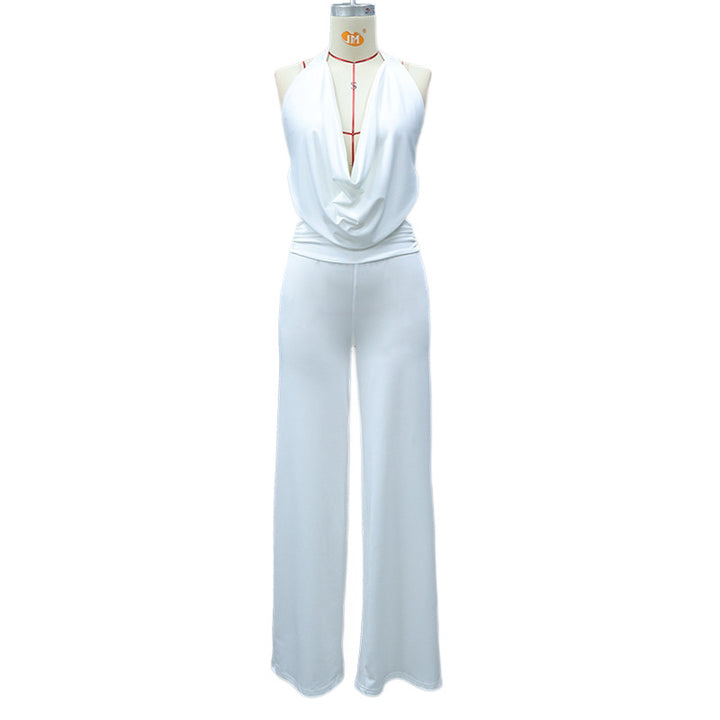 Dame Jumpsuit med elegant indpakningsdetalje og brede benpartier Skovae
