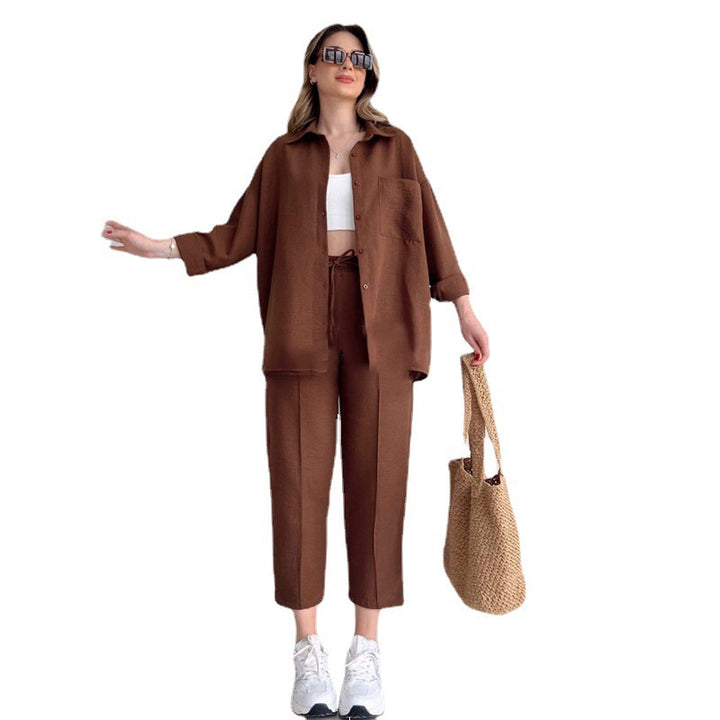 Dame fritids-to-dels sæt i let linned med cropped top og bred bukser Stilla