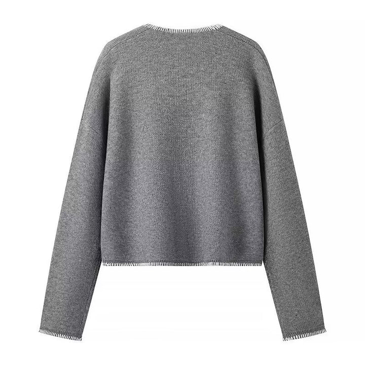 Dame sweater med dyb V-udskæring og praktiske lommer Stilla