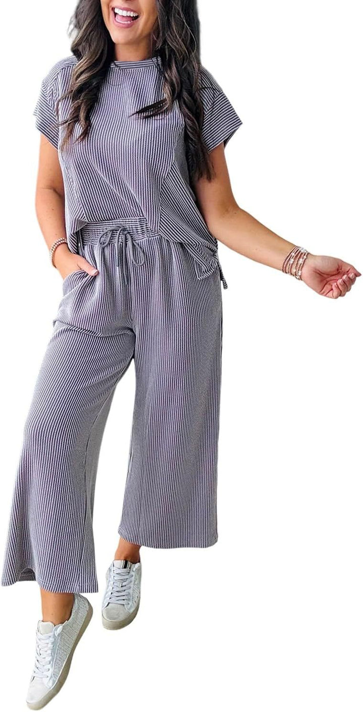 Dame afslappet strik-jumpsuit med brede ben og elastisk talje Stilla