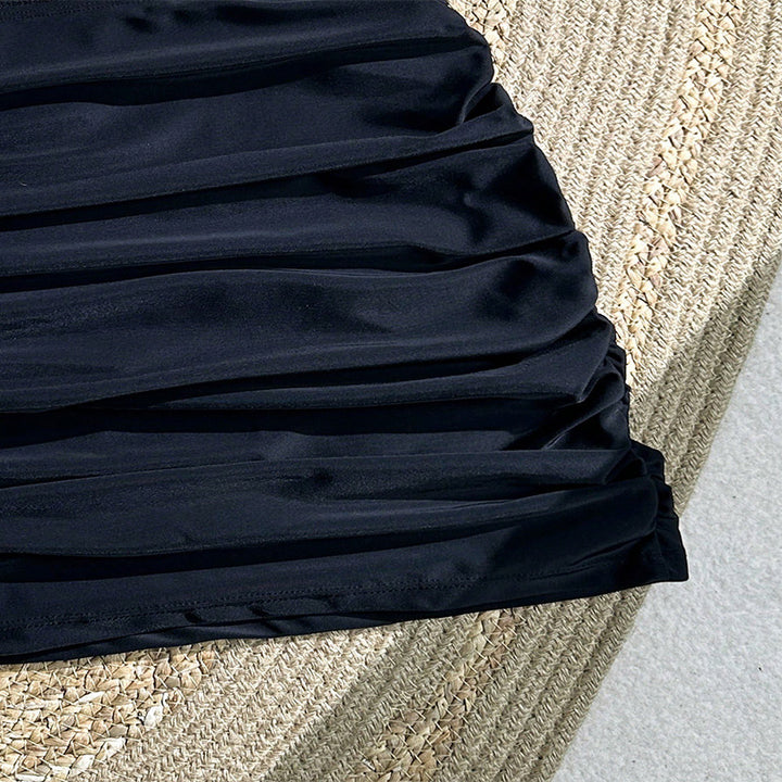 Dame rynkeshorts med elastisk talje og figurskabende design Stilla