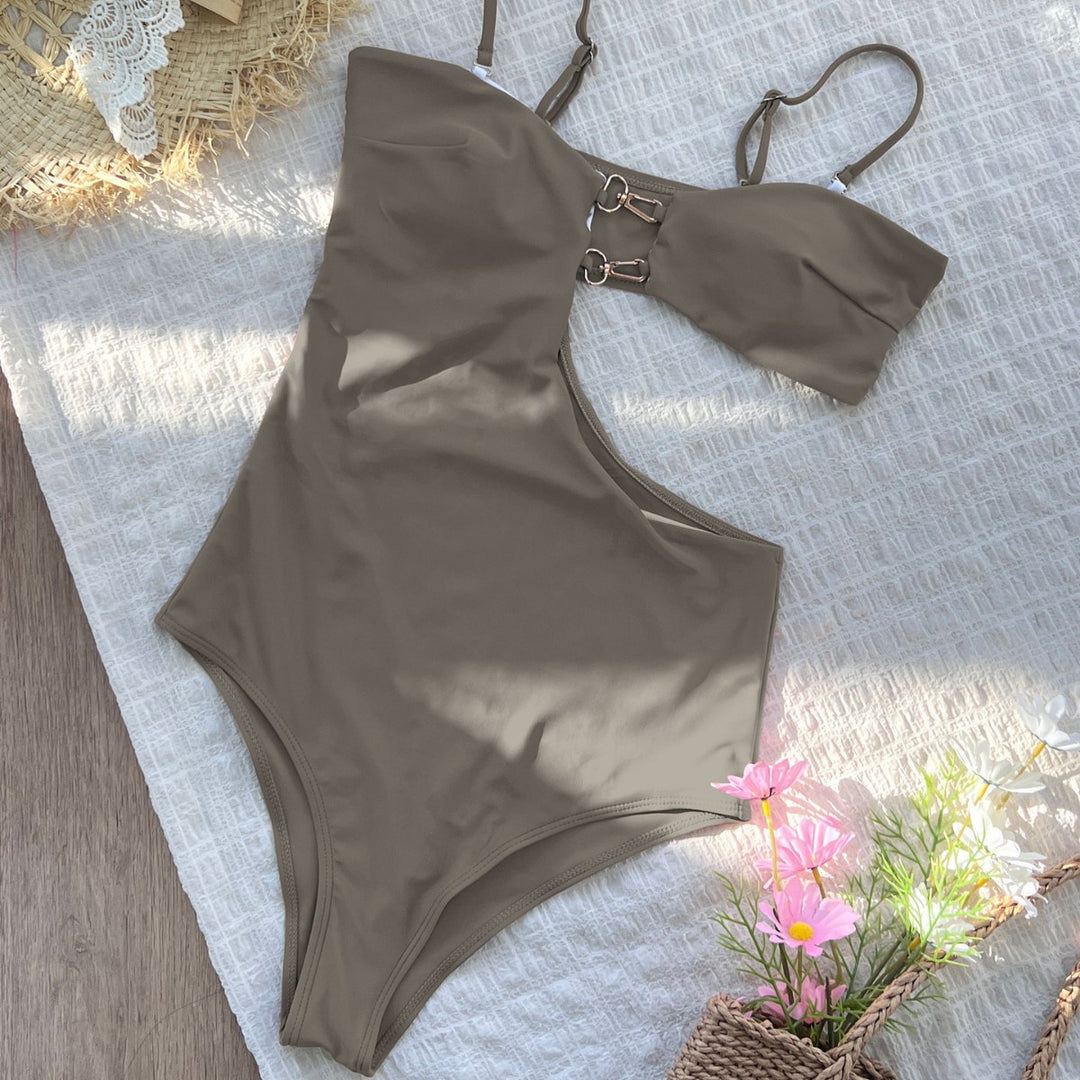 Dame badedragt med asymmetrisk cut-out og stilfuld ringdetalje Stilla