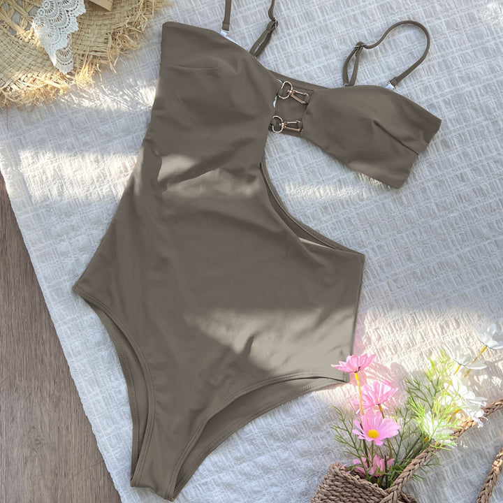 Dame badedragt med asymmetrisk cut-out og stilfuld ringdetalje Stilla