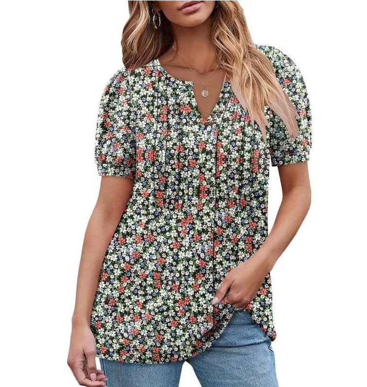 Damebluse med flæseærmer og blomsterdesign Stilla