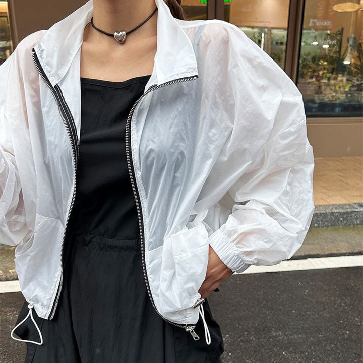 Damer transparent vindjakke med lynlås Stilla