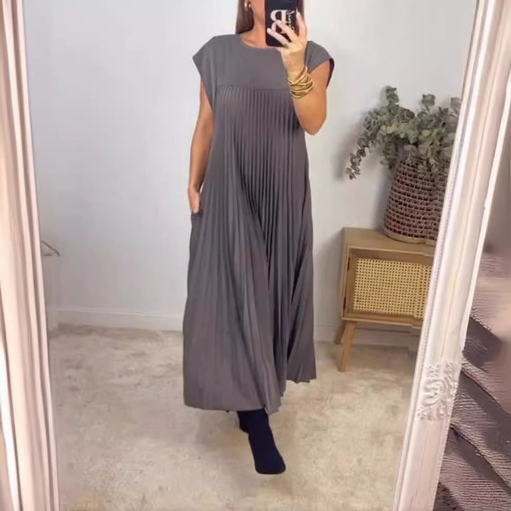 Dame Maxikjole med raffineret plisseret design og sidelommer Stilla