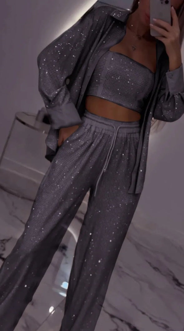 Dame fritids-loungewear sæt med glitrende top og elastiske bukser Stilla