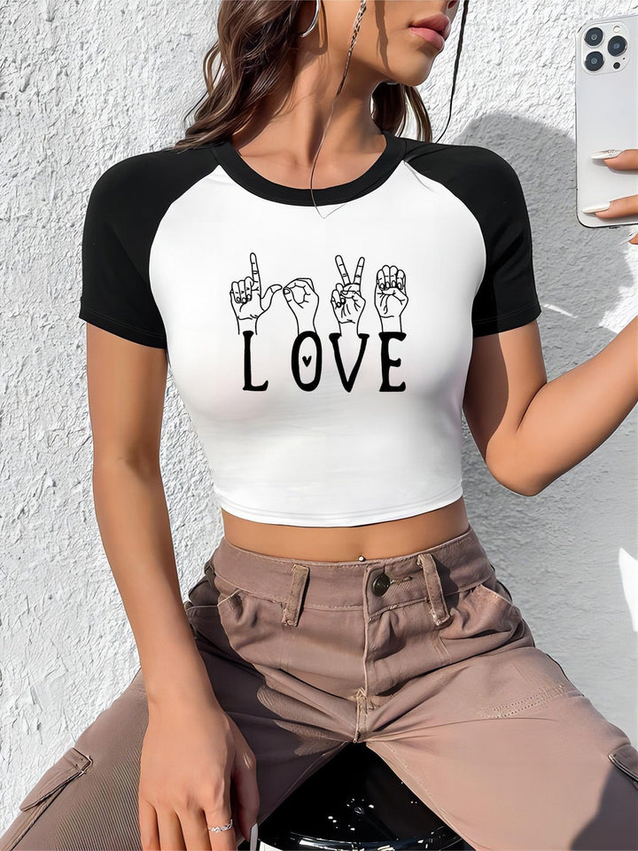 Dame Crop-top med motiverende tekst og afslappet snit Skovae