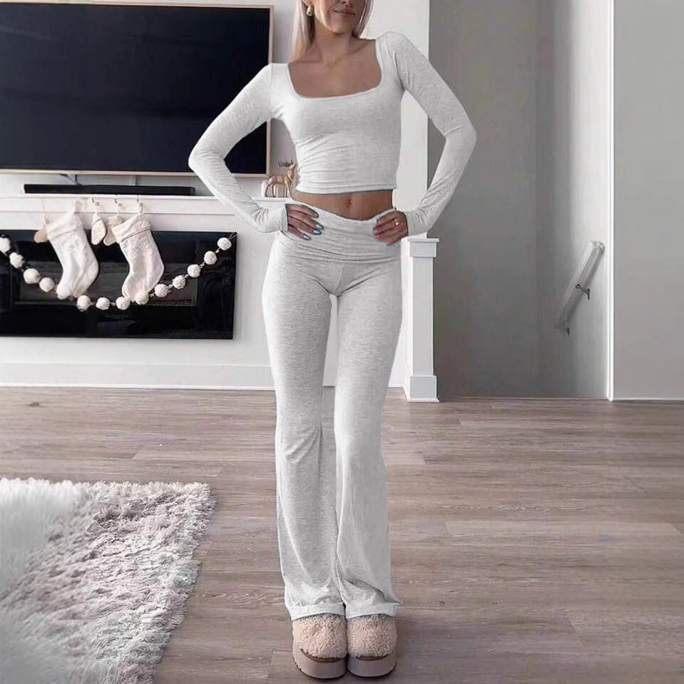 Dame sporty to-delt sæt med langt overdel og flared bukser Stiila