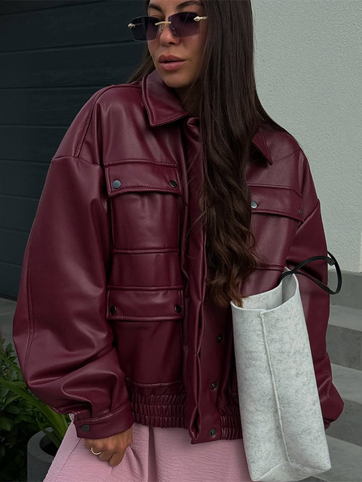 Dame oversized kunstlæderjakke med funktionelle lommer og elastisk bund Stilla