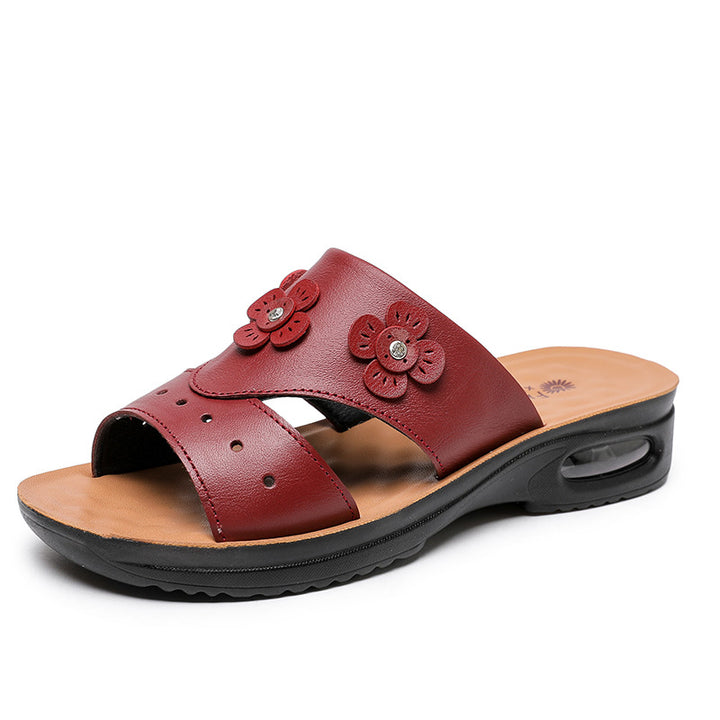 Femme dekorative Slide Sandaler med florale accenter Stilla