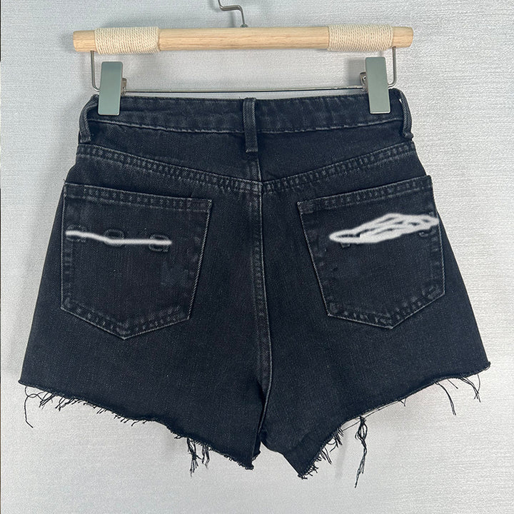Dame Destroyed Denim-Shorts med høj talje og frynser Stilla
