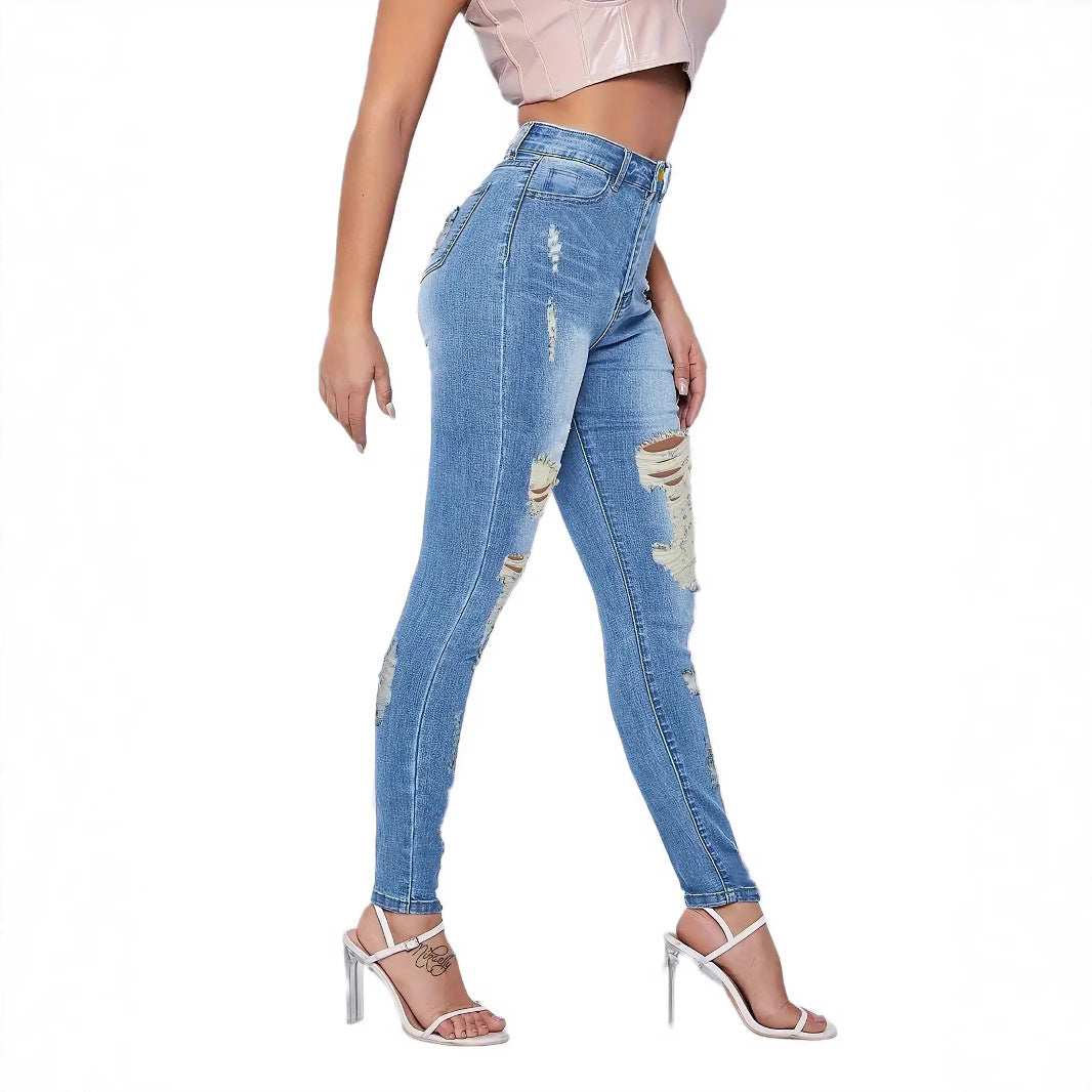 Dame højtaljede skinny jeans med moderigtige revnedetaljer og figurskabende stretch Stilla