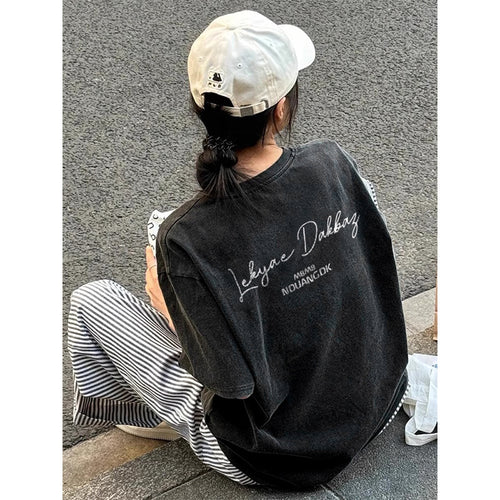 Dame Trend T-shirt med moderne skrift og afslappet snit Stilla
