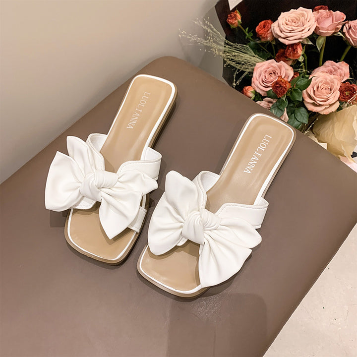Dame mules med fashionable sløjfe-detalje og skridsikker sål Stilla