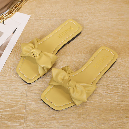 Dame mode slippers med legende sløjfe-design og behagelig sål Stilla