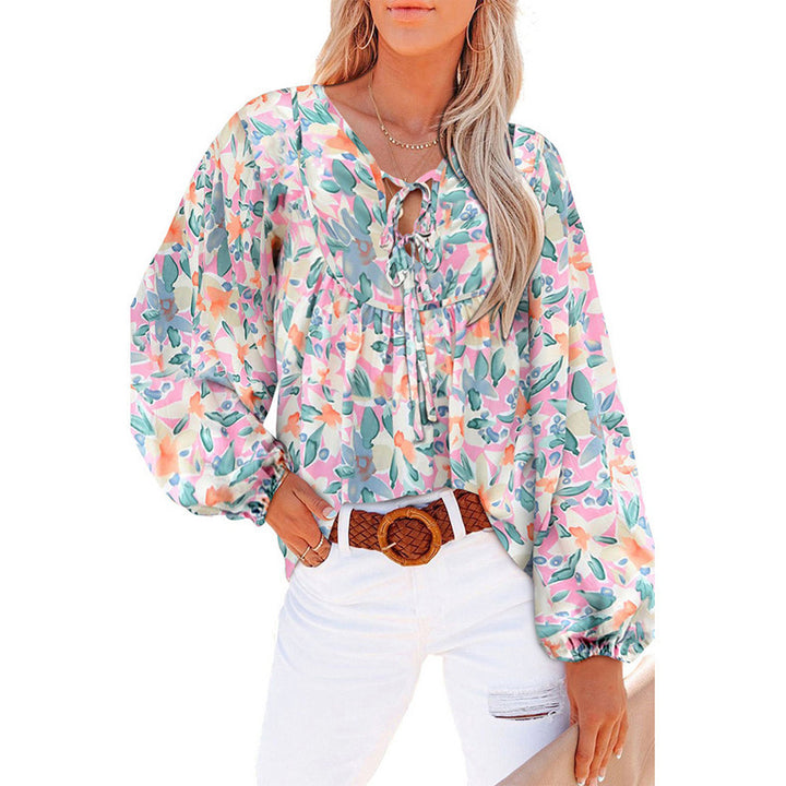 Damebluse med blomsterdesign og voluminøse ærmer Stilla