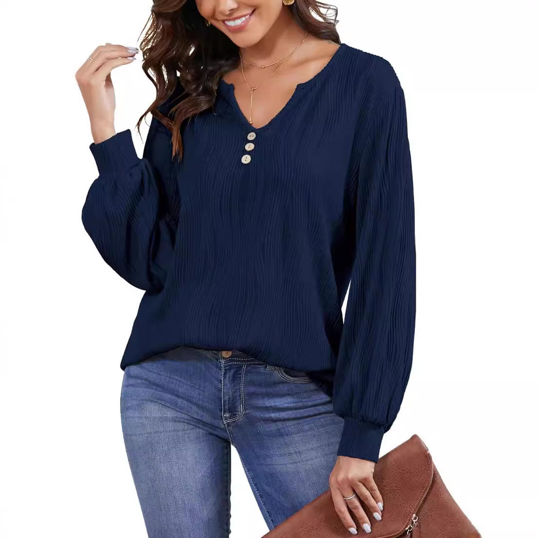 Dame afslappet bluse med struktureret design og knaplukning Stilla