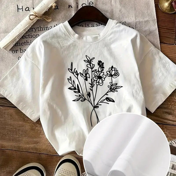 Dame T-shirt med kreativt blomstertryk og afslappet pasform Stilla