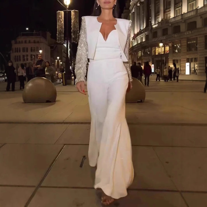 Dame Elegant jumpsuit med raffineret V-udskæring og svingende ben Stilla