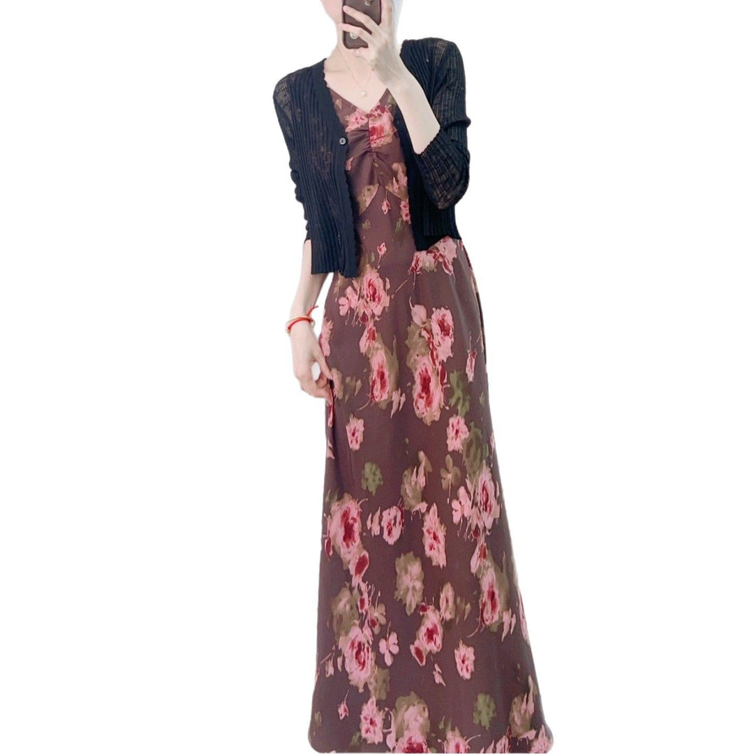 Dame maxikjole med blomstertryk og elegant, figursyet snit Stilla