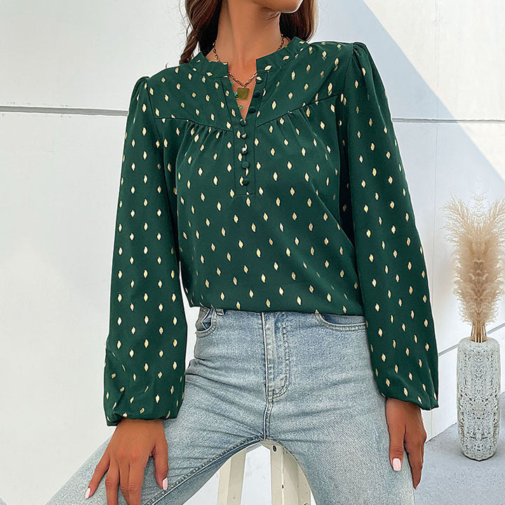 Damebluse med fint print og knapdetaljer Stilla