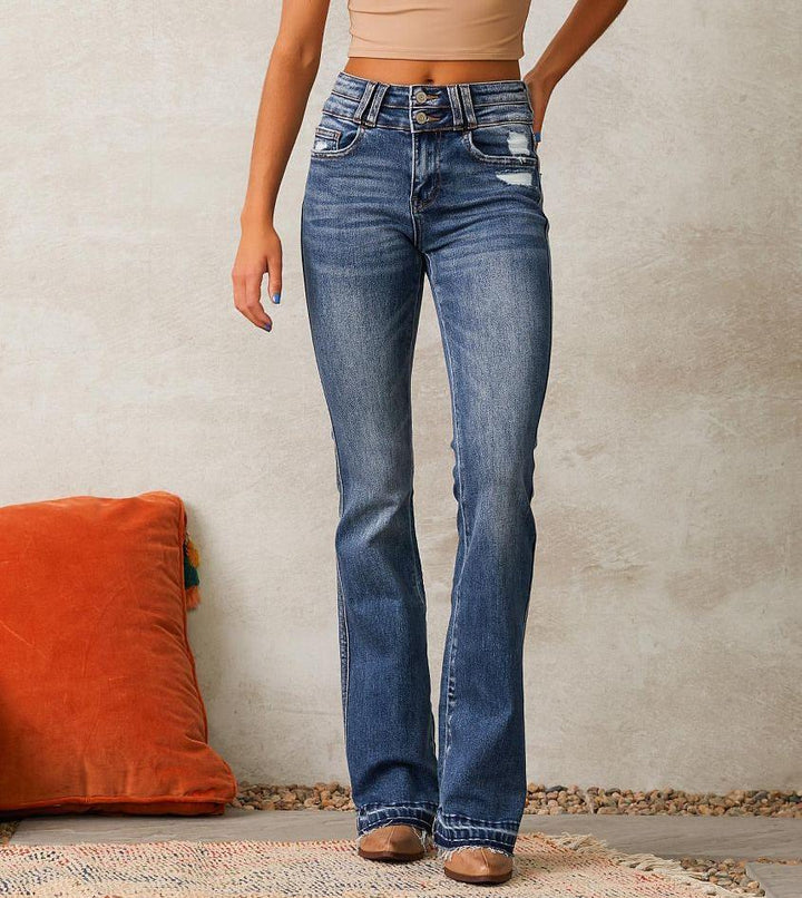 Kvinde udvidede jeans med høj talje og moderne skræmmede effekt Skovae