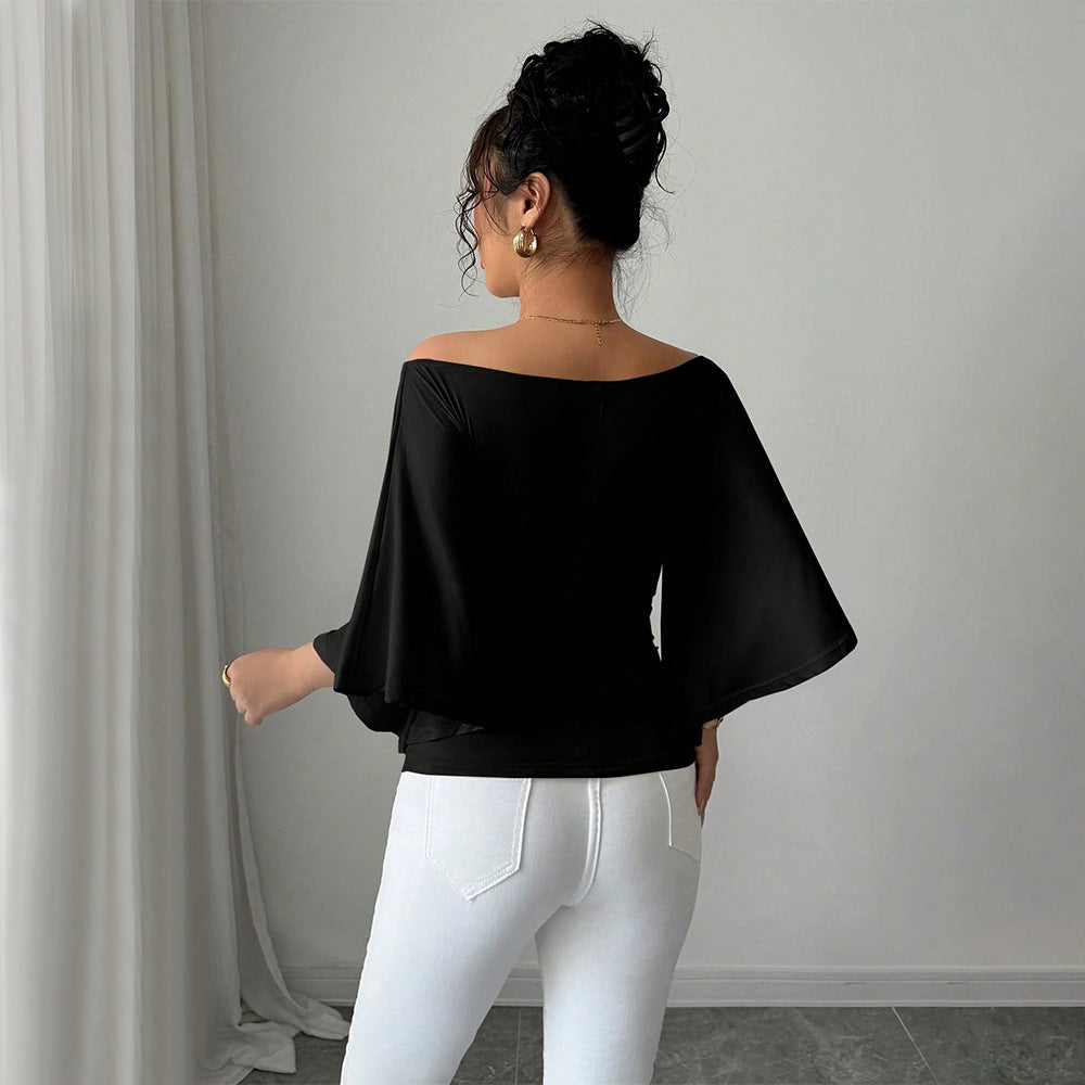 Kvinders elegante off-shoulder top med brede ærmer og tætsiddende pasform Stilla